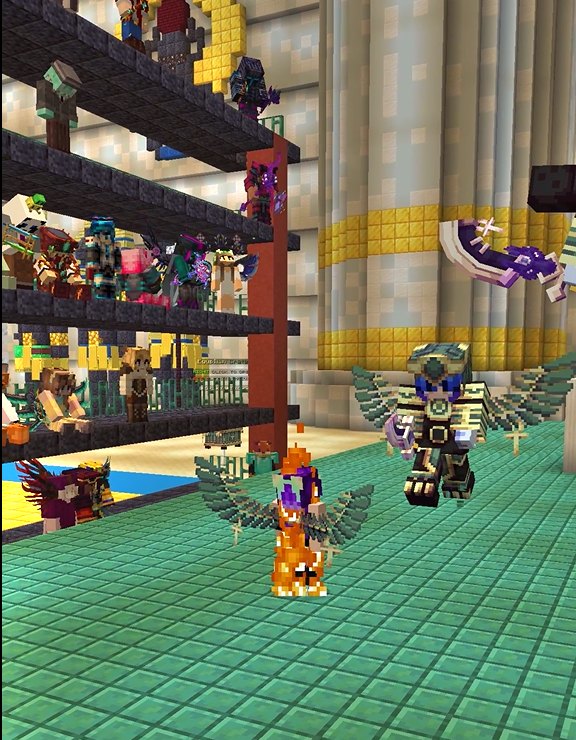 Players in custom armor and wings gathered at spawn